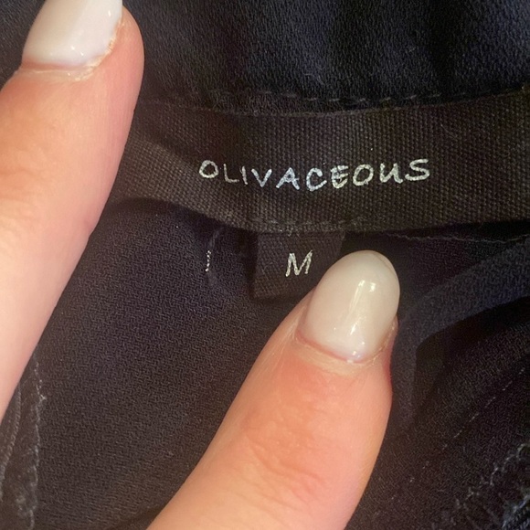 Women’s Olivaceous Short Sleeve Black Romper Size Medium - Picture 4 of 5